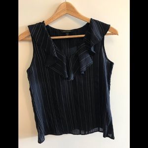Blue summer sleeveless blouse with ruffle collar